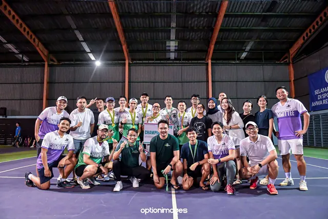 Clash of Squads champions and committee celebrating with their trophy and medals
